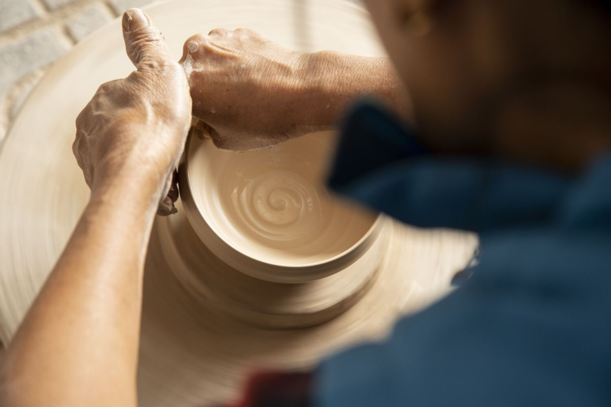 Local artisans crafting traditional pottery in Bat Trang village